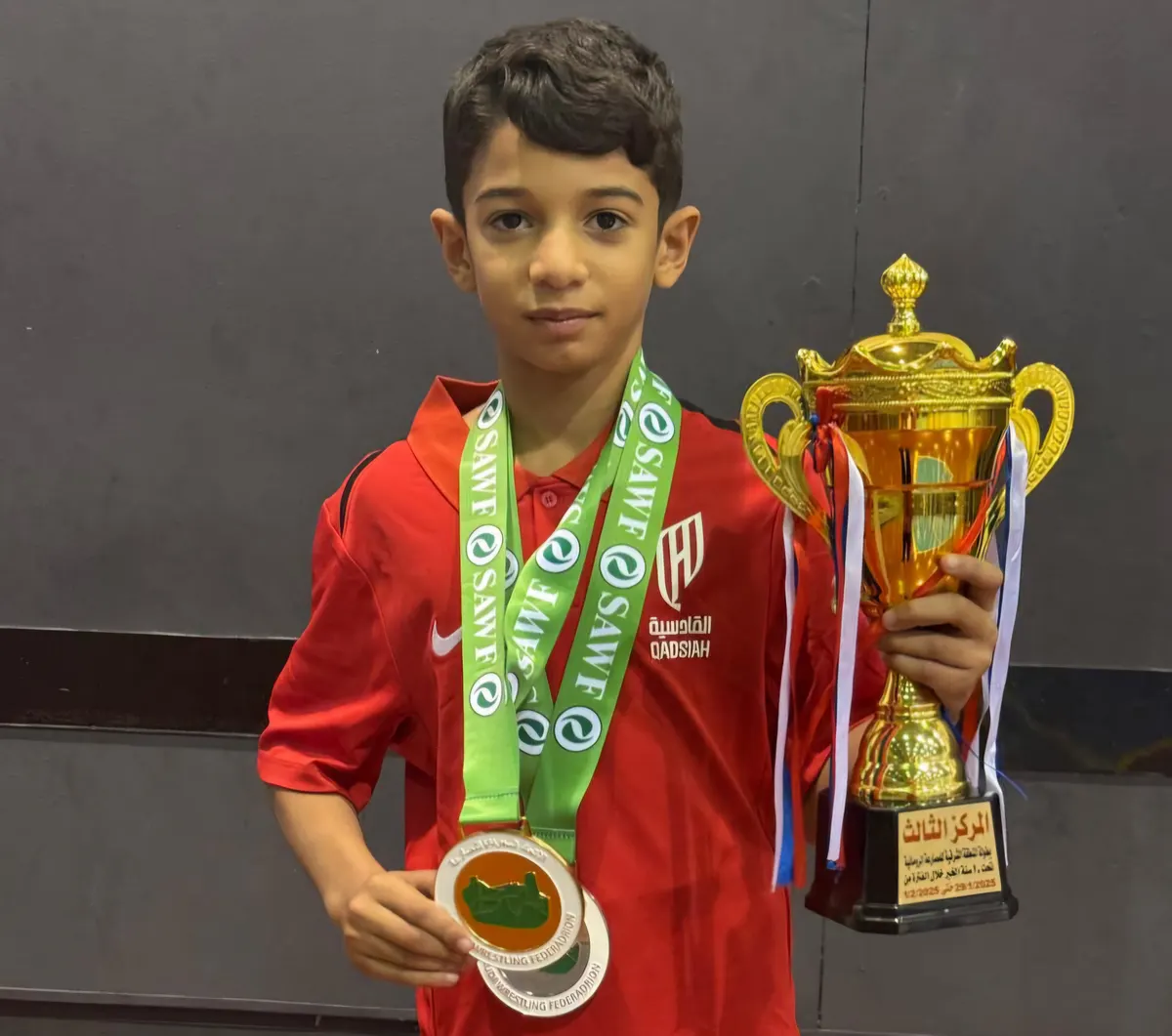 من القطيف.. اللاعب «حسين آل ناس» يحصد المركز الأول في بطولة المنطقة الشرقية للمصارعة الحرة لفئة البراعم تحت 12 سنة بوزن 29 كجم